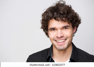 Close Up Portrait Of A Handsome Guy With A Smile On His Face