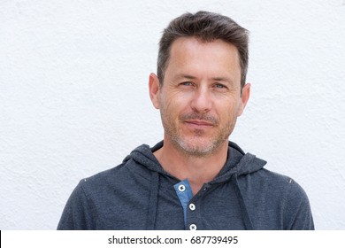 Close Up Portrait Of Handsome Older Man Standing In Contemplation