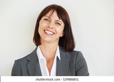 Close Up Portrait Of Happy Business Woman Standing By White Wall