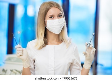 Close Up Portrait Of Happy Confident Female Dentist