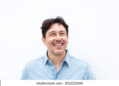 Close Up Portrait Of Happy Older Man Looking Away And Smiling Isolated On White Background