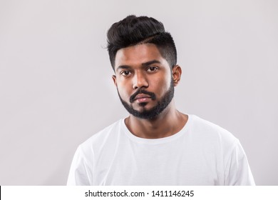 Close Up Portrait Of Happy Young Indian Man