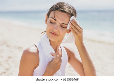 Close Up Portrait Of Healthy Woman Wipe Out Her Sweat With Towel After Workout