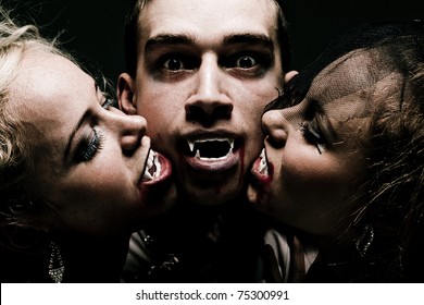 Close Up Portrait Of Hungry Vampire Family