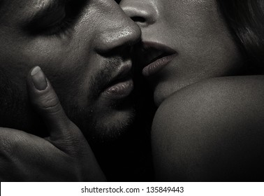 Close Up Portrait Of A Kissing Couple