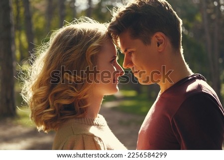 Similar – 2 young women sitting opposite each other