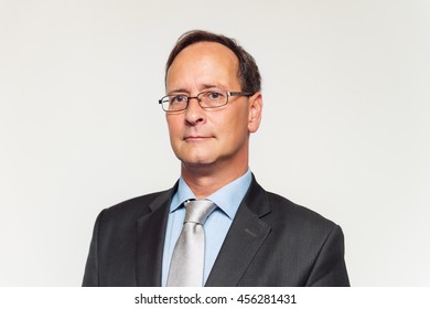 Close Up Portrait Of Middle-age Man In Formalwear 