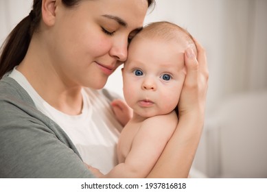Close up portrait of mother and her newborn baby. Healthcare and medical love woman lifestyle mother s day concept.