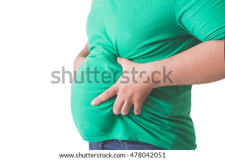 close up portrait of overweight obese man's hand holding his big belly