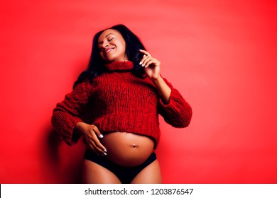 close up portrait of pregnant woman with big belly, hands hold, 