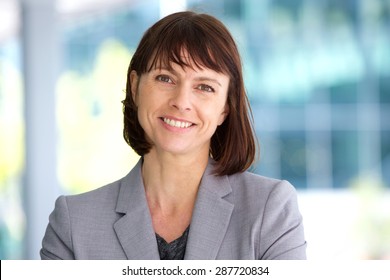 Close up portrait of a professional business woman smiling outdoor