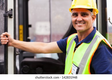 Close Up Portrait Of Senior Forklift Driver