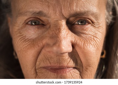 Close up portrait of senior woman with blue eye's looking at the camera. - Powered by Shutterstock