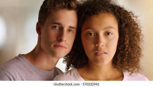 Close Up Portrait Of Serious Young Couple