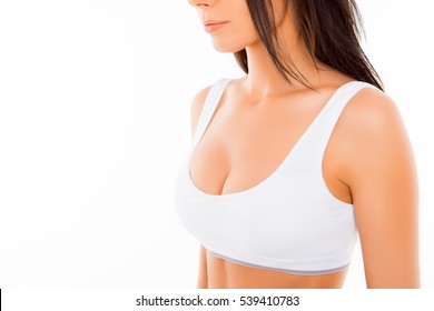 Close up portrait of shapely young woman in white bra