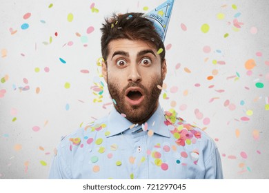 Close Up Portrait Of Shocked Unshaven Handsome Man Dressed Formally, Comes To Corporate Party, Being Surprised To Realize That He Left All Money At Home. People, Celebration, Facial Expressions