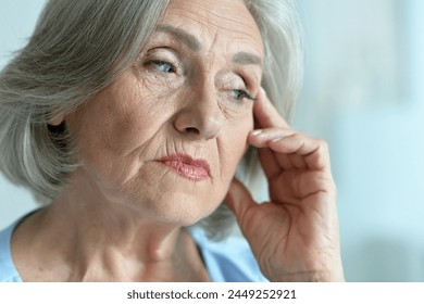 Close up portrait of a sick senior woman. High quality photo - Powered by Shutterstock