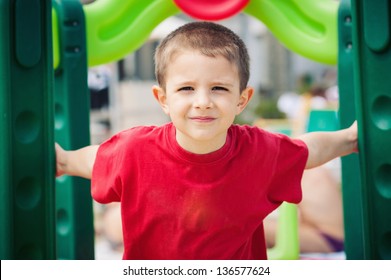 Close Up Portrait Of Smiling Five Year Old Boy.