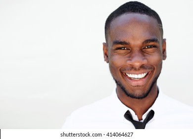 Close Up Portrait Of Smiling Handsome Young African Man On White Background