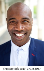 Close Up Portrait Of A Smiling Older African American Businessman 