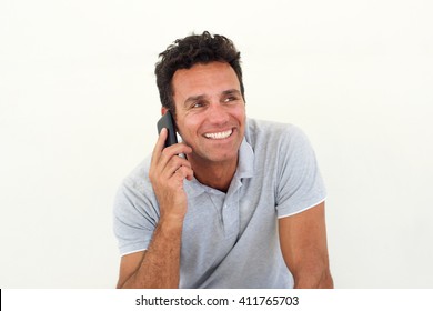 Close Up Portrait Of Smiling Older Man Talking On Mobile Phone