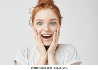 Close Up Portrait Of Surprised Happy Freckled Redhead Girl