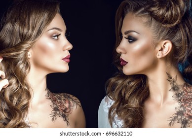 Close Up Portrait Of Two Sides Of The Same Woman With Artistic Make Up, Hairstyle And Body Art On Her Shoulder. One Half Symbolizes Her Good Nature, Another One Is A Dark Side. Human Nature Concept