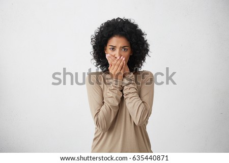 Image, Stock Photo Black woman covering her eyes with her hands.