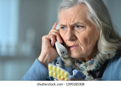 Close up portrait of upset senior woman - Powered by Shutterstock