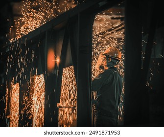 Close up portrait view of professional mask protected welder man in uniform working on the metal sculpture at the table in the industrial fabric workshop in front of few other workers. - Powered by Shutterstock