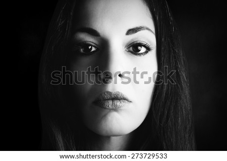 Close portrait of woman. Black and white photography. 