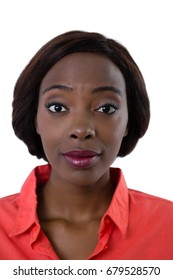 Close Up Portrait Of Woman With Raised Eyebrows Against White Background