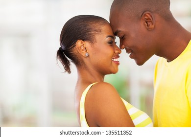 Close Up Portrait Of Young African American Couple Flirting