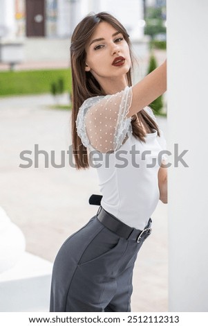 Similar – Thoughtful girl next to a window