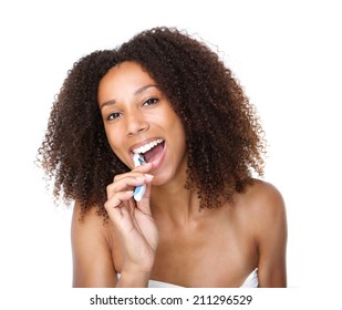 Close Up Portrait Of A Young Black Woman Brushing Teeth