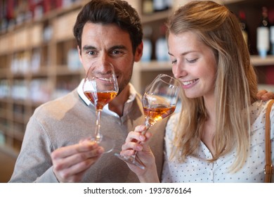 Close Up Portrait Of Young Couple At Wine Tasting