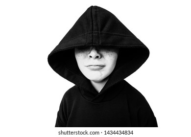 A close up portrait of a young emotional boy in a hood. Kids, beauty, casual fashion. - Powered by Shutterstock