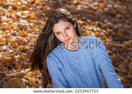 Similar – Outdoor portrait of beautiful happy teenager girl