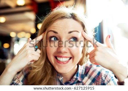 Close up portrait of young smart successful female smiling, woman funny emotions.