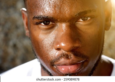 Close Up Portrait Of A Young Sports Man With Dripping Sweat On Face