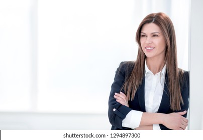 Close Up Portrait Of Young Woman In Business Suit