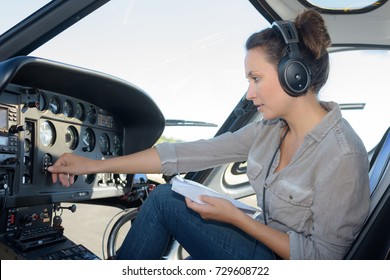 Close Up Portrait Of Young Woman Helicopter Pilot