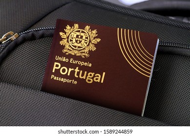 Close up of Portuguese Passport in Black Suitcase Pocket 