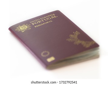Close up of Portuguese passport (European Union) in white background