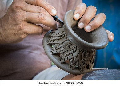 Close Up Potter Artist Working On Clay Pottery Sculpture Fine Art In Thailand 