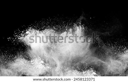 close up of powder or flour on black background