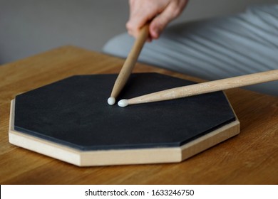 Close Up Of Practicing On A Drum Pad