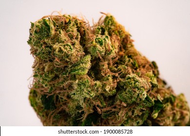 Close Up Prescription Medical Marijuana Flower. CBD Cannabis Bud Photography For Dispensary Menu. Medical Marijuana Strain. Weed Bud, Weed Flower On White Background.