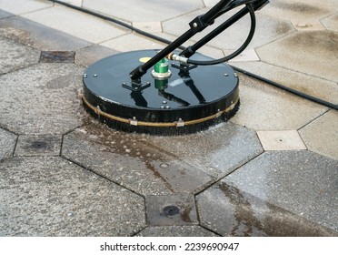 Close up Pressure Washing Driveway Surface Cleaning - Shutterstock ID 2239690947