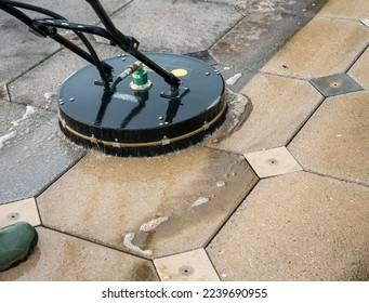 Close up Pressure Washing Driveway Surface Cleaning - Shutterstock ID 2239690955